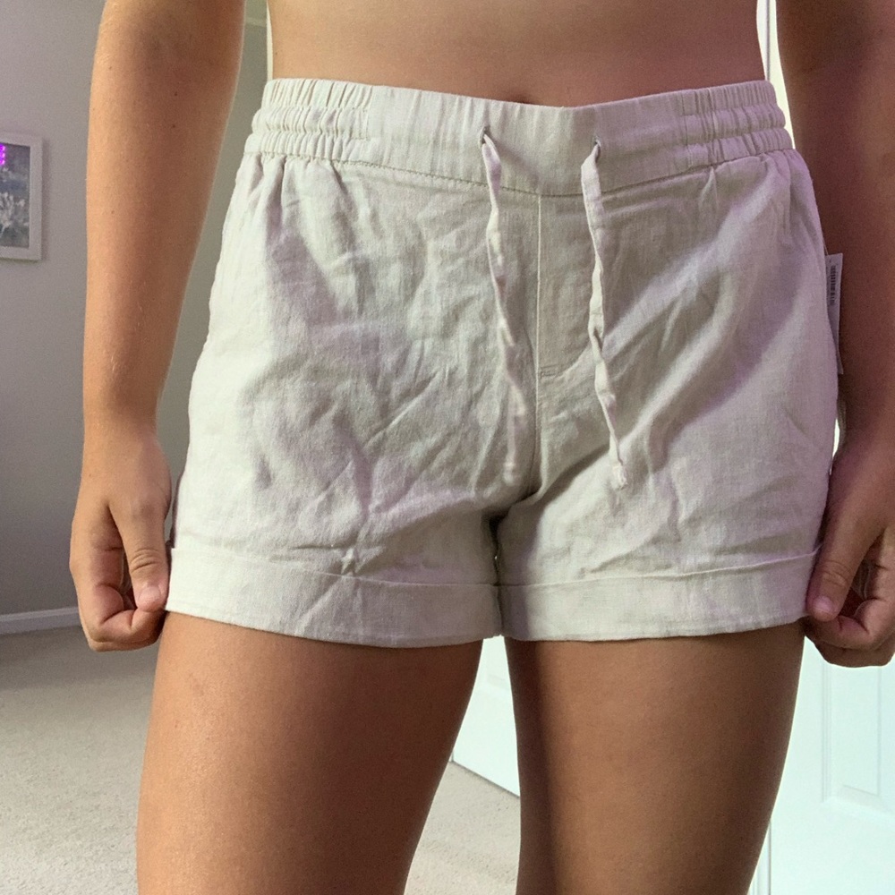 loose, beige old navy shorts